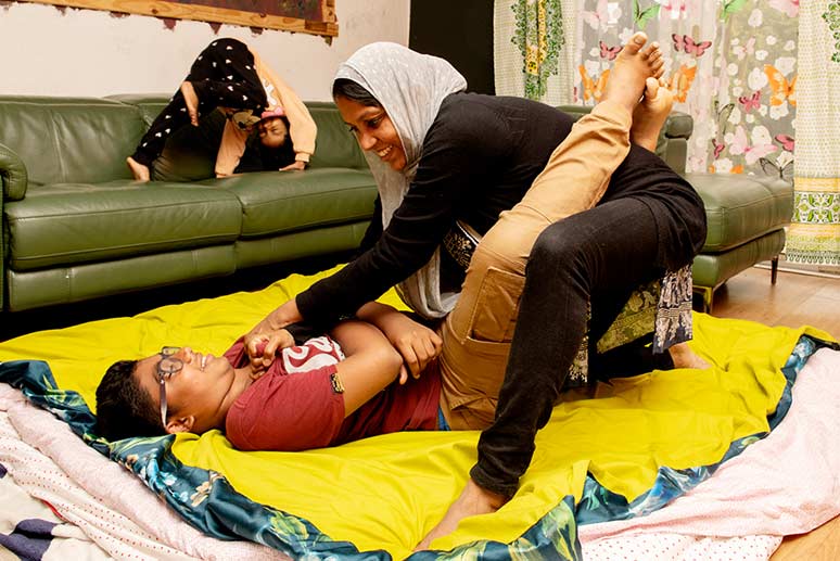 Mehbooba, practising Jujitsu moves at home with her children.